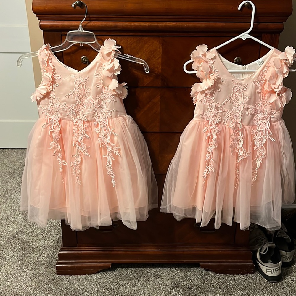 A pink,coral dress a size a youth 14